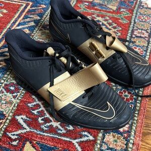 Nike Black and Gold Romeleo 3